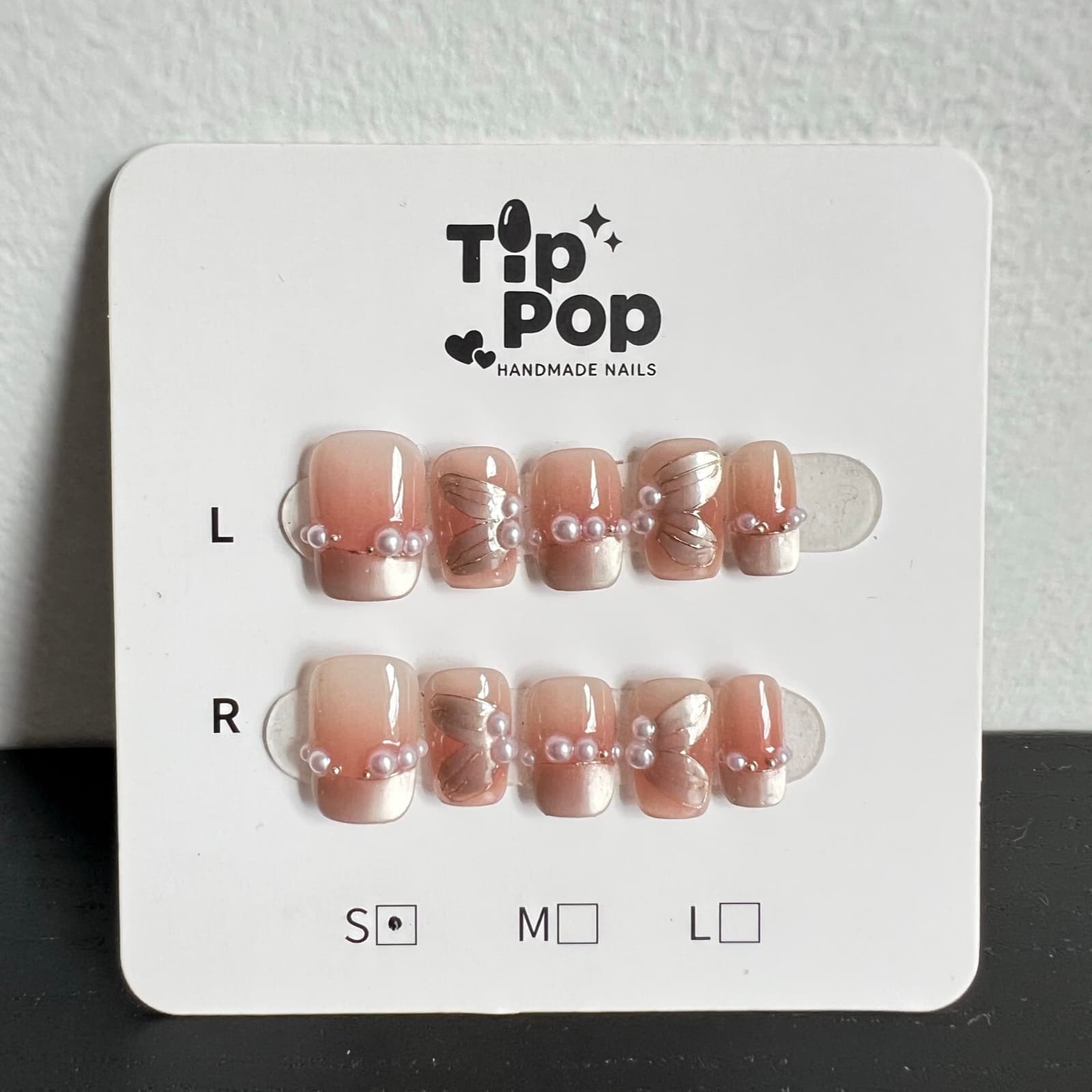 Butterfly Chain French press-on nail set on a TipPop Nails card