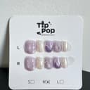 Lilac Pearl Marble press-on nail set on a TipPop Nails card