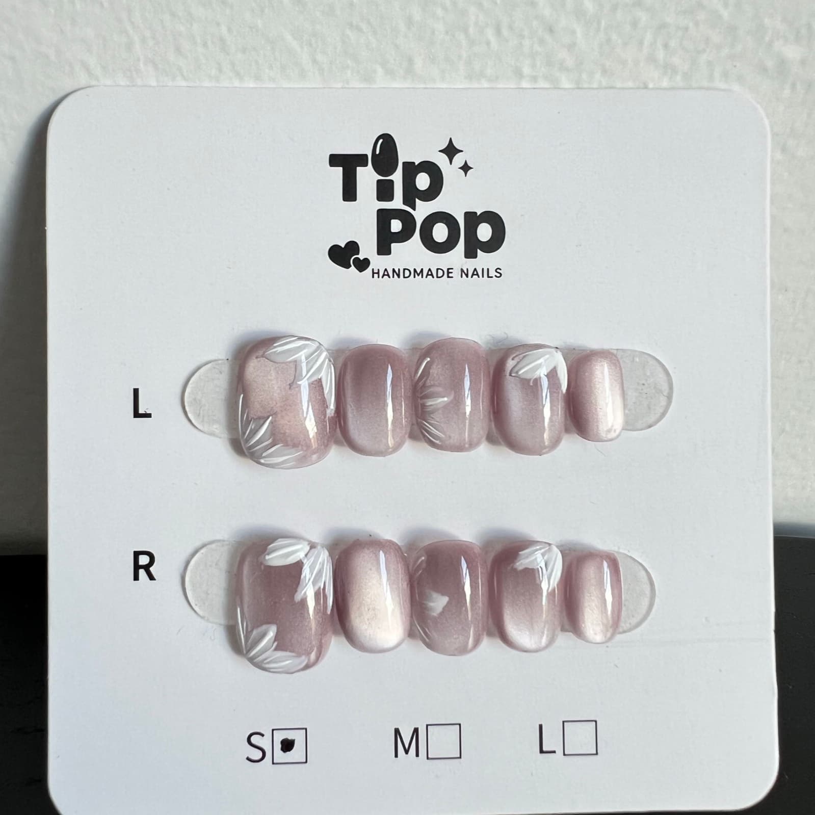 Mauve Petal Whisper press-on nail set on a TipPop Nails card
