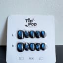 Navy Lightning Leaf press-on nail set on a TipPop Nails card