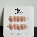 Pearl Vine French press-on nail set on a TipPop Nails card