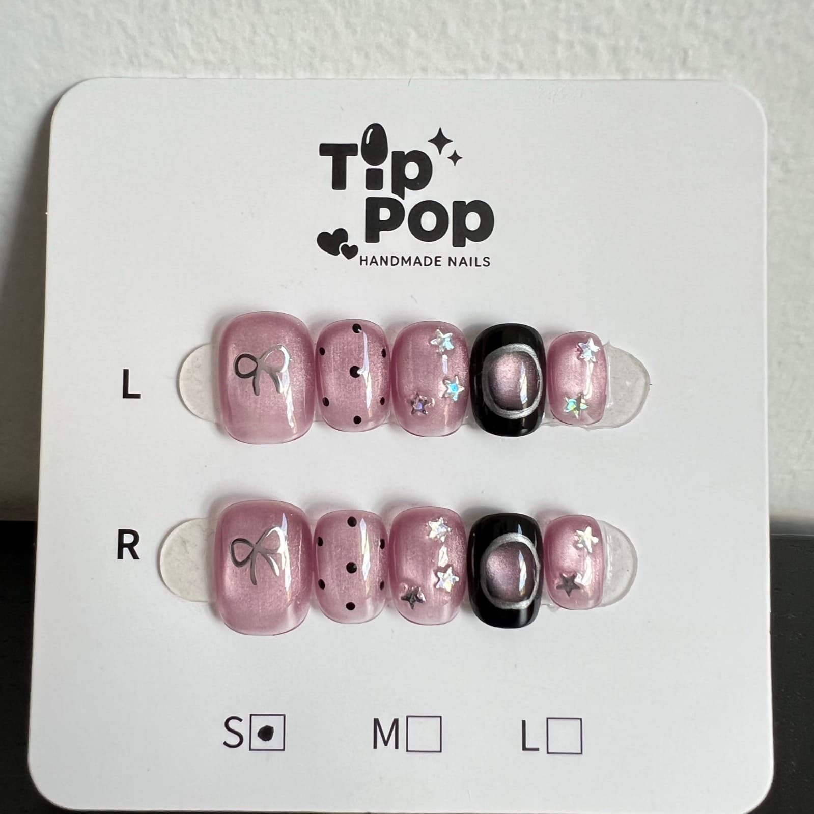Pink Bow Moonlight press-on nail set on a TipPop Nails card
