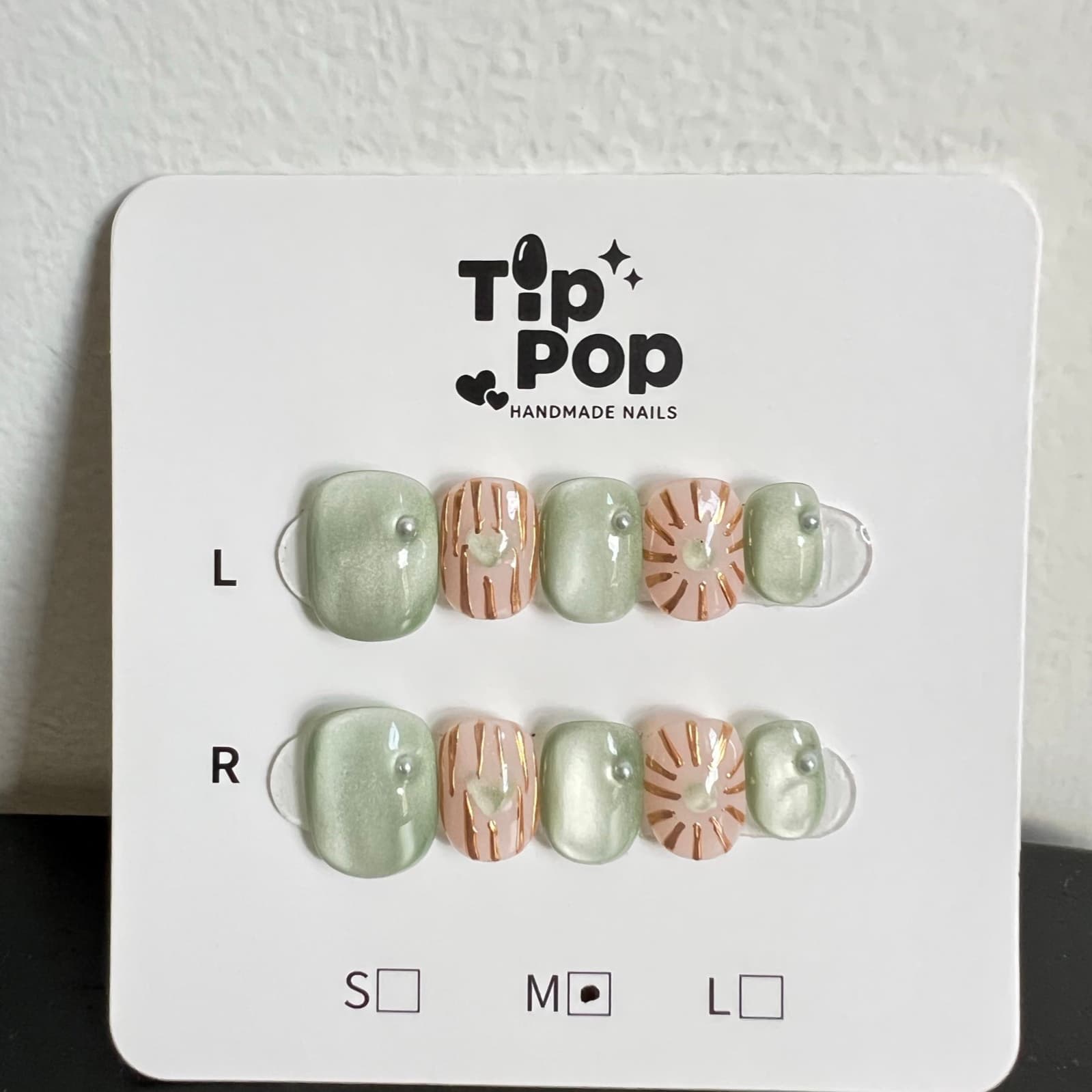 Sage Blush Foil press-on nail set on a TipPop Nails card